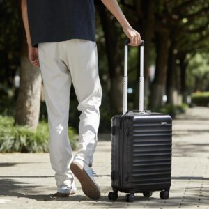 Amazon Basics Hartschalen-Trolley mit Schwenkrollen - 55cm Handgepäck-Größe, für Ryanair und die meisten anderen Billigfluglinien genehmigt, Schwarz – Bild 7